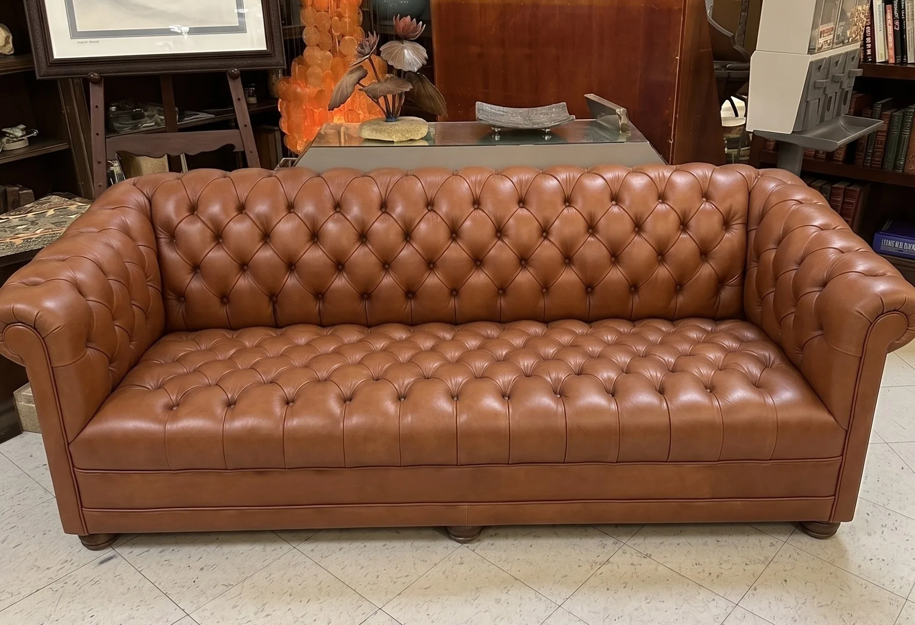 Tan Chesterfield sofa after recolour and cleaning